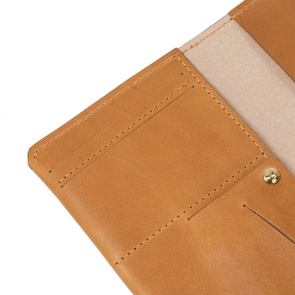 Premium Leather AirTag Passport Holder - Track and Protect Your Belongings